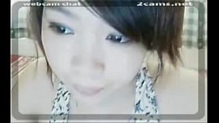 Cute Asian teen with a cute face toy fucks her pussy