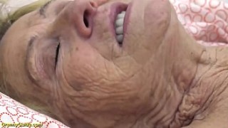 Sexy granny Maris feeding her old cunt