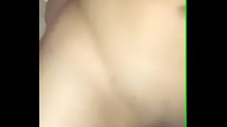 Sexy young blonde with nice tits plays with a vibrator on the bed