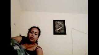 Wild amatuer chick shows striptease and masturbation